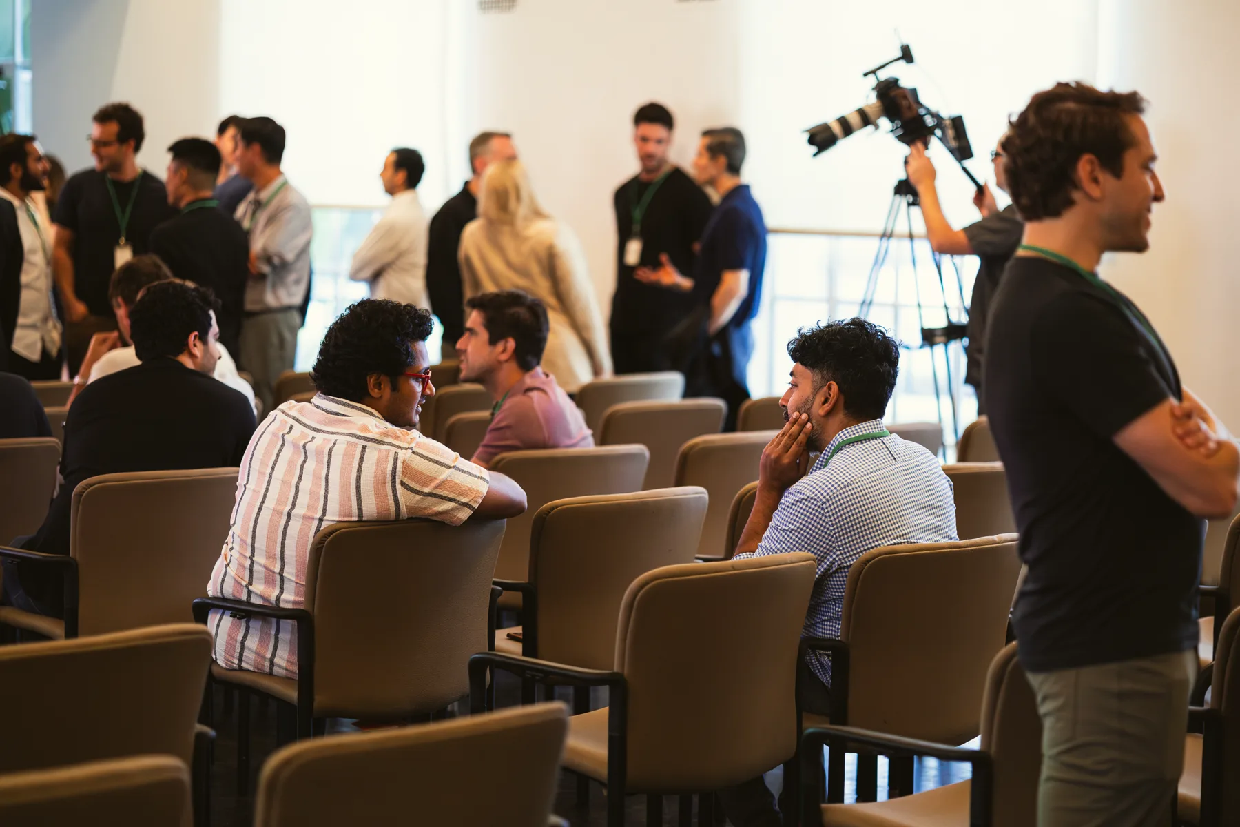 Guests in the room before the Fireside Chat